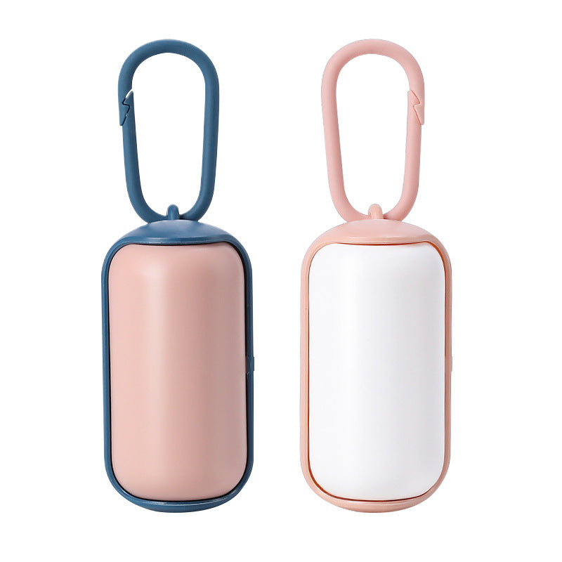 Distributeur portable de sacs poubelles pour chats et chiens