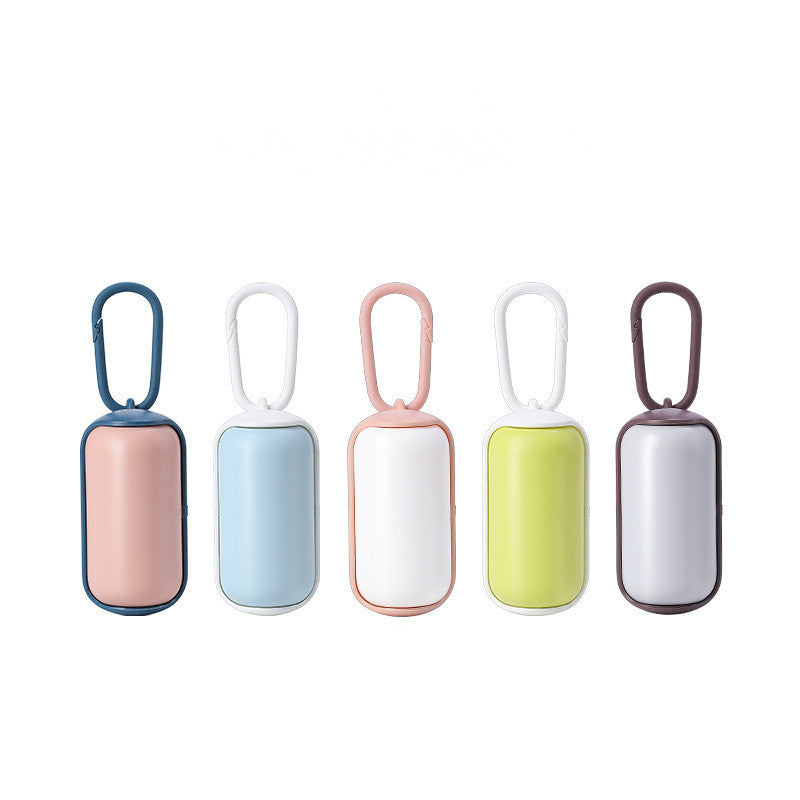 Distributeur portable de sacs poubelles pour chats et chiens